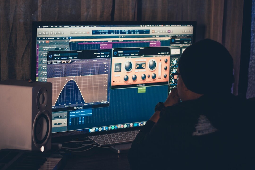 Broadcast engineer checking video signal on a professional monitor displaying waveforms