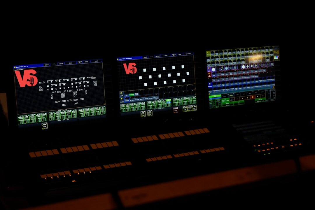 Advanced broadcast control room with multiple screens and live feed monitors