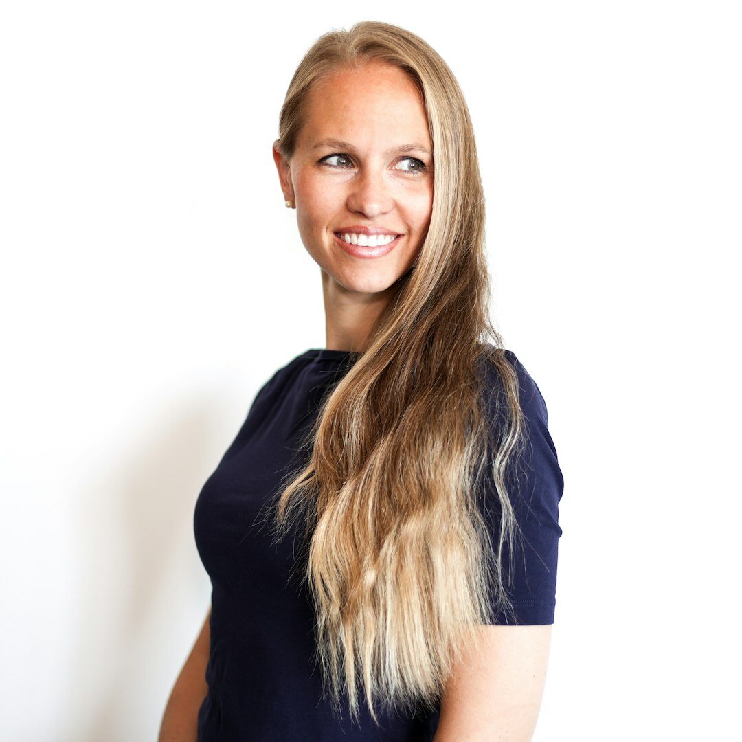 Professional headshot of a female media production trainer