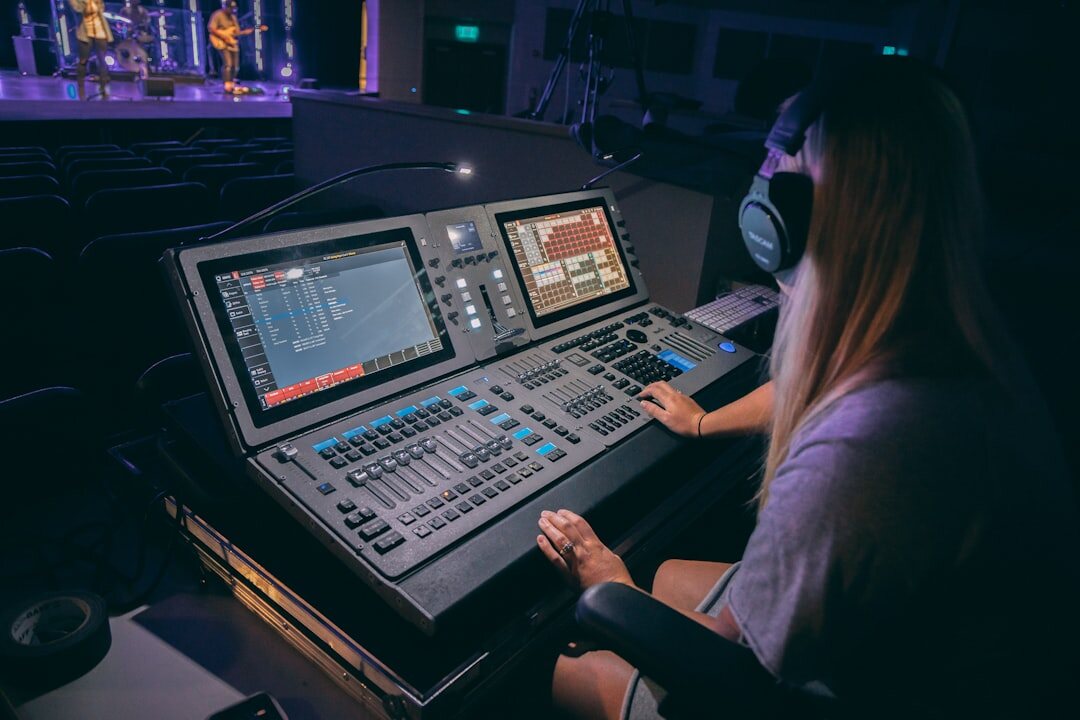 Modern broadcast training facility with high-end production equipment and screens