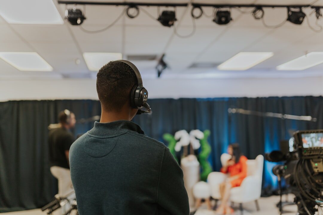 Professional broadcast studio with cameras and lighting rigs during a live event